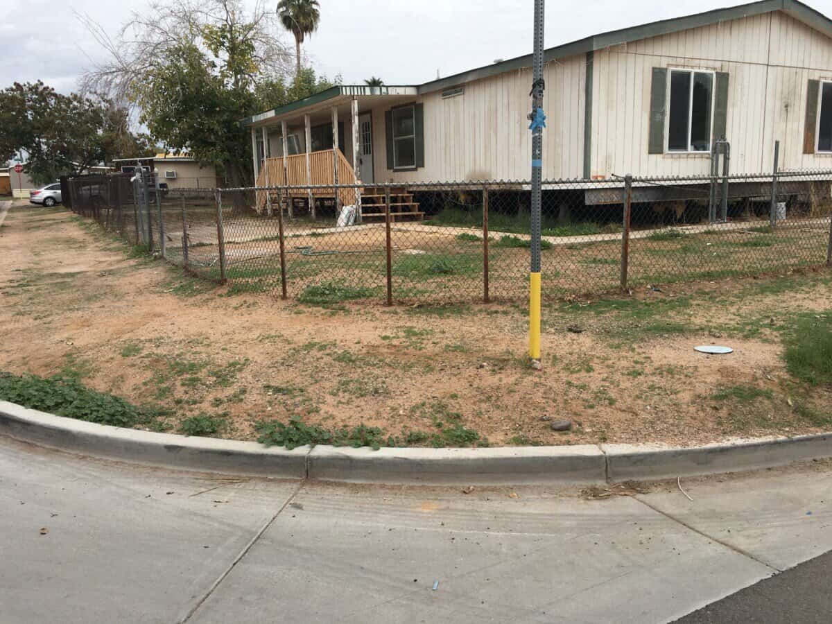 Old Mobile Home with old single pane aluminum windows and old original doors